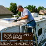 A male technician repairing camper roof