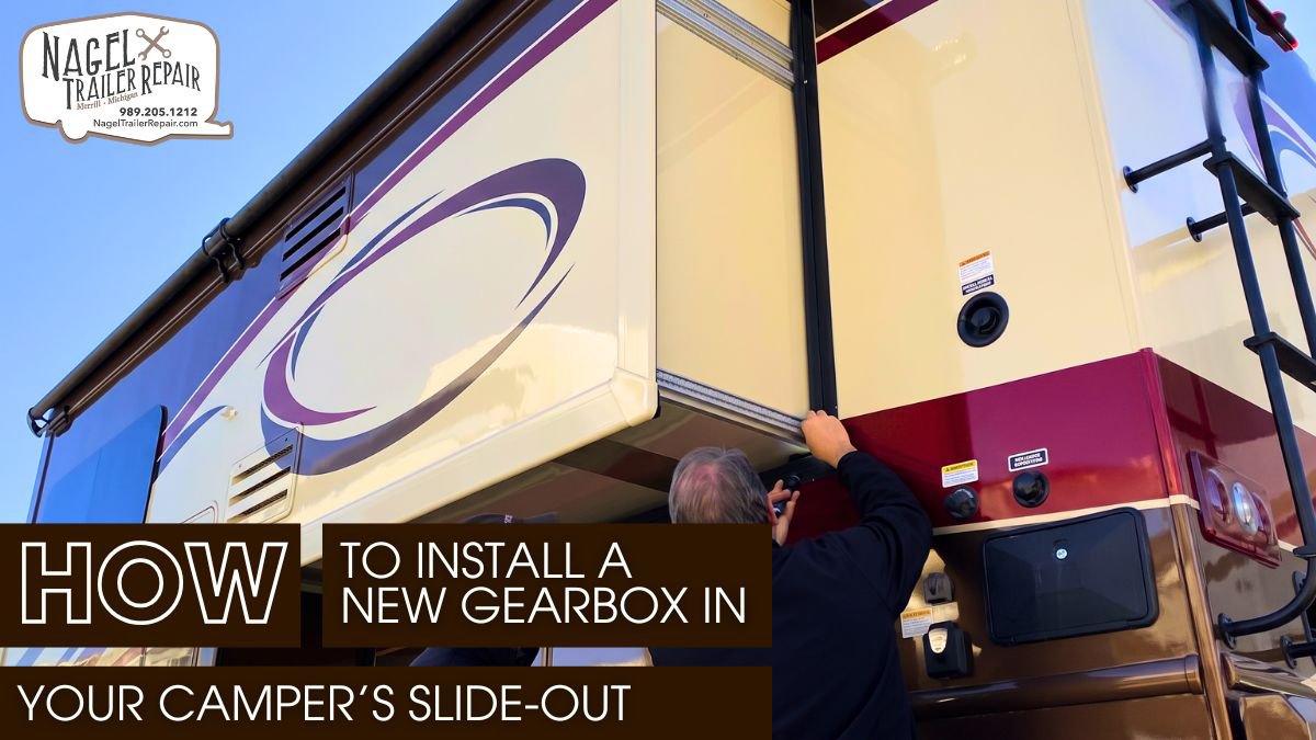 Two Men Inspecting the Slide-Out Gearbox of a Camper