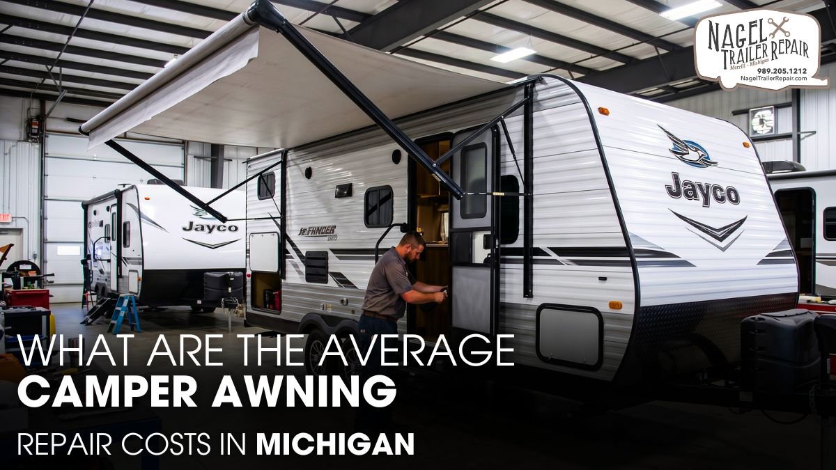 A Male Technician Checking A Jayco Camper's Awning inside A Workshop