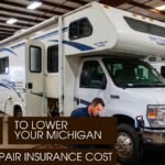 A Male Technician Repairing an RV Camper Inside a Workshop
