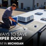 A Male Technician Doing A Camper Roofing Job Outside of a Workshop