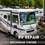 A Class A Motorhome Parked Outside of a Workshop for Repair Works
